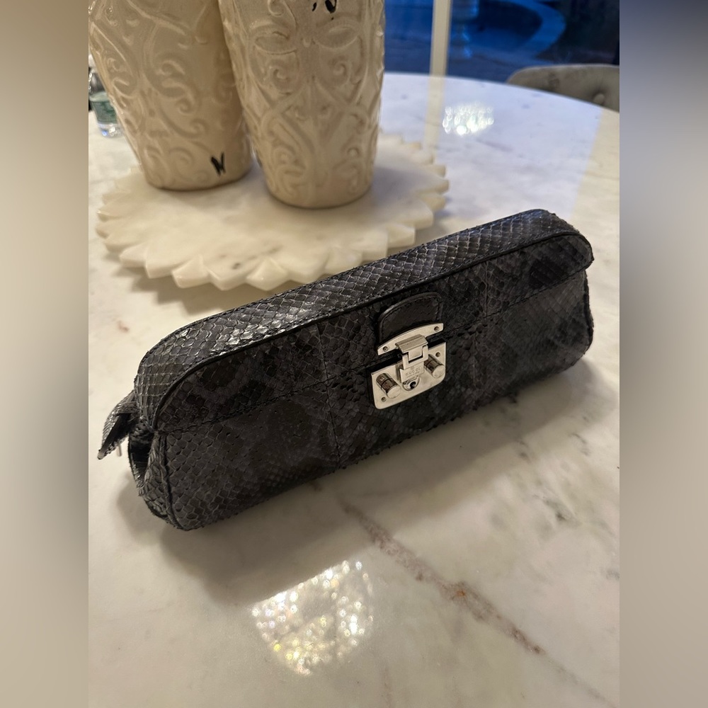 Gucci python lady lock clutch. Worn 2 times.